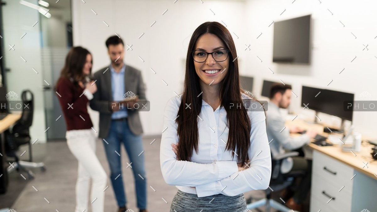 demo-attachment-472-portrait-of-young-businesswoman-posing-in-office-WEU5FBG